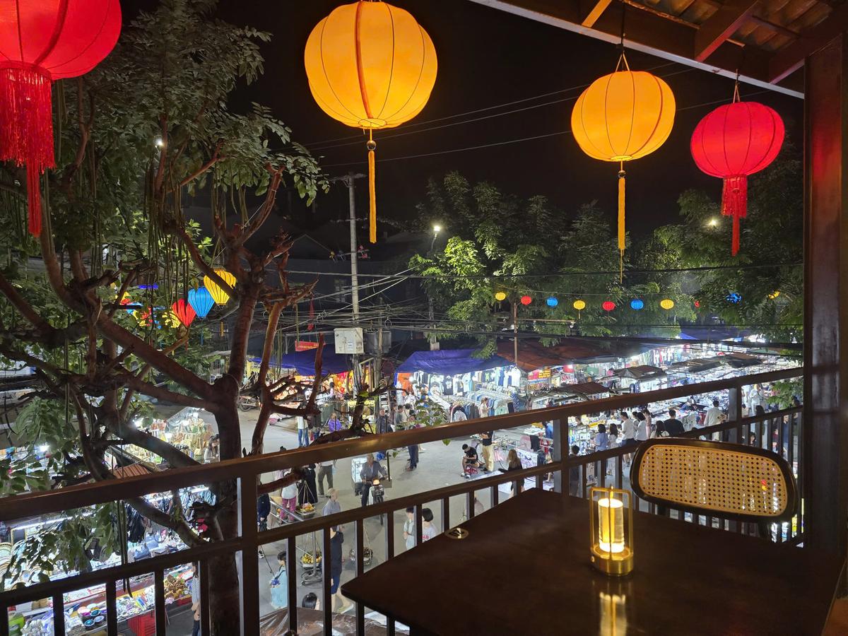 Second floor balcony dining at CUA VANG Seafood — best restaurant view in Hoi An Vietnam
